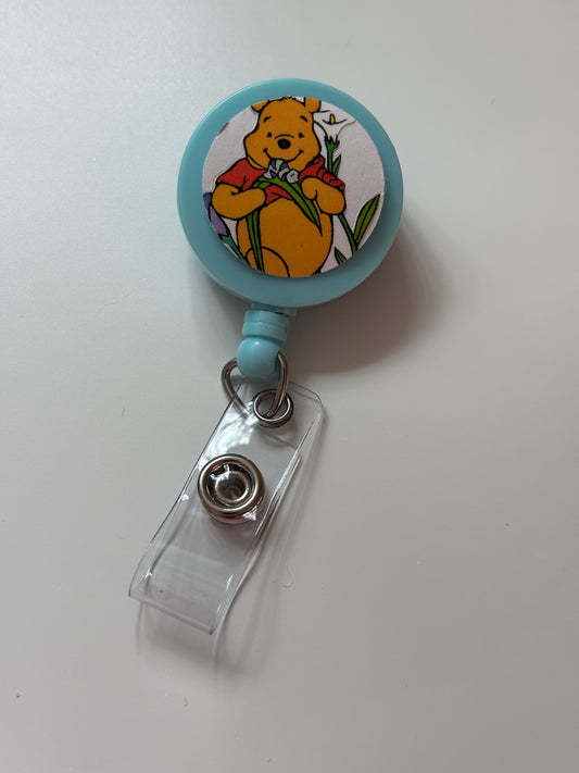 Blue Flower Pooh Badge Reel